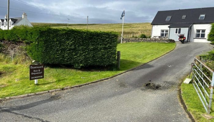 Worn out driveway to B&B in Scotland