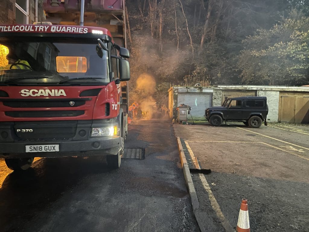 Armstrong's Surfacing night crew working with tarmacadam Scotland